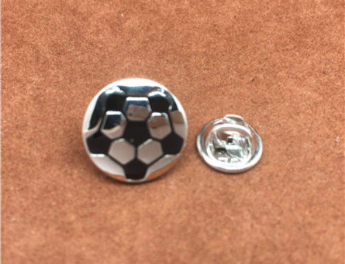 Football lapel pin with butterfly style buckle